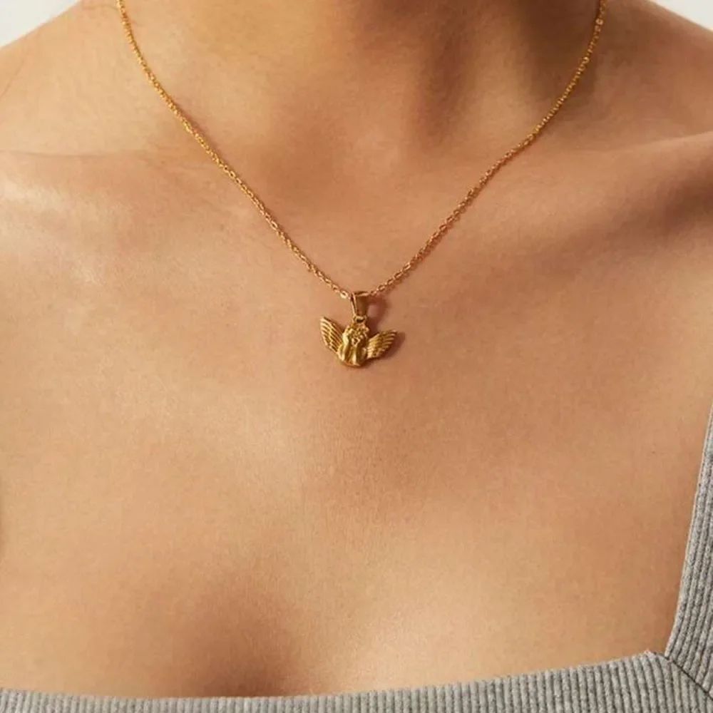Anthropologie Gold Winged Pendant Necklace